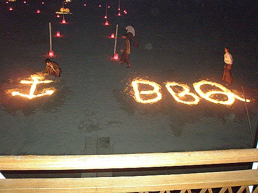 P1070059.JPG - The staff have lit candles on the sandbank.